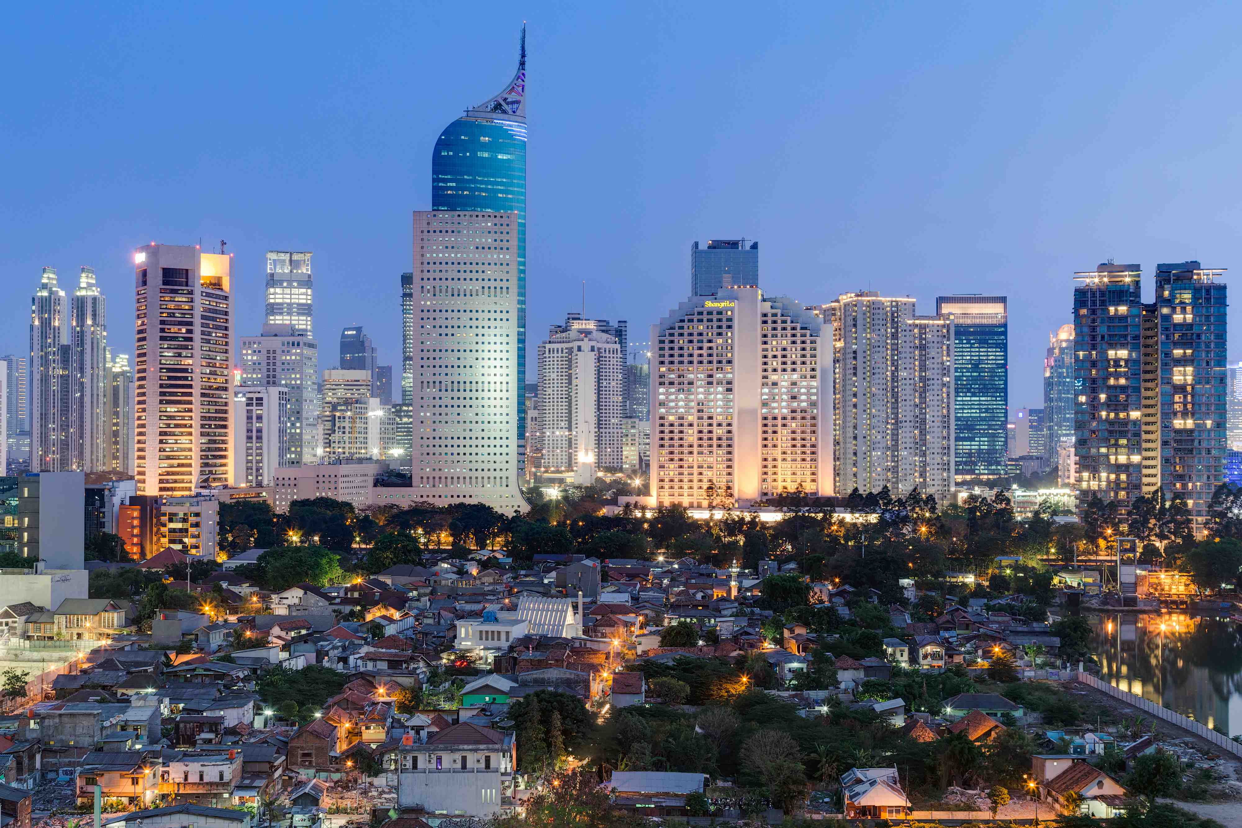 Jakarta skyline with high-rise buildings at  sunset